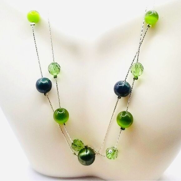 Jewelry - silver toned layered green floating Beaded womans necklace and earrings set.